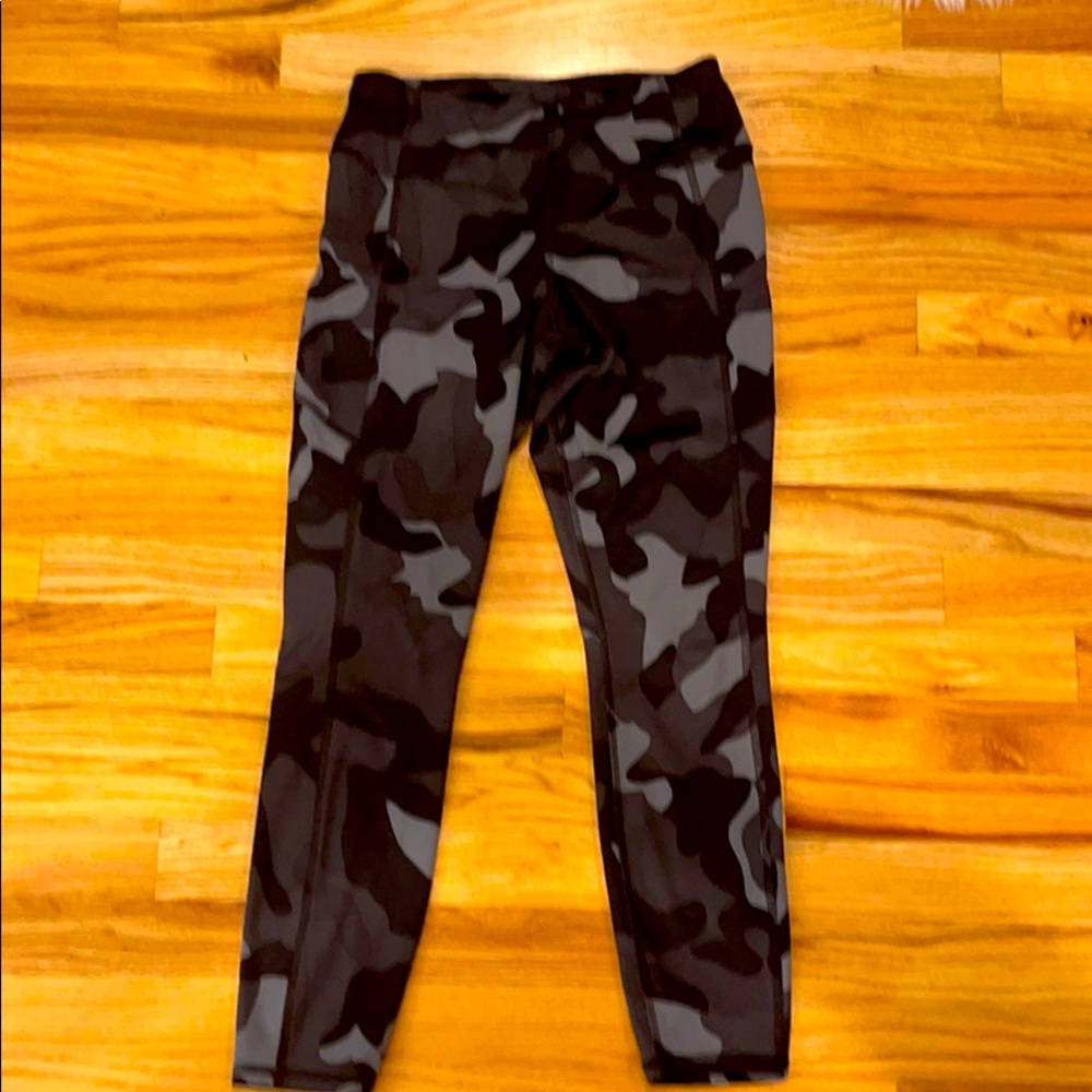 Black and gray camo leggings with side zip pockets